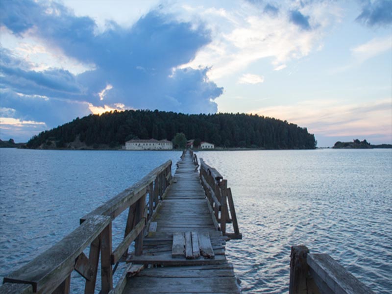 Image of wooden bridge across Narta Lagoon to Zvernec Island