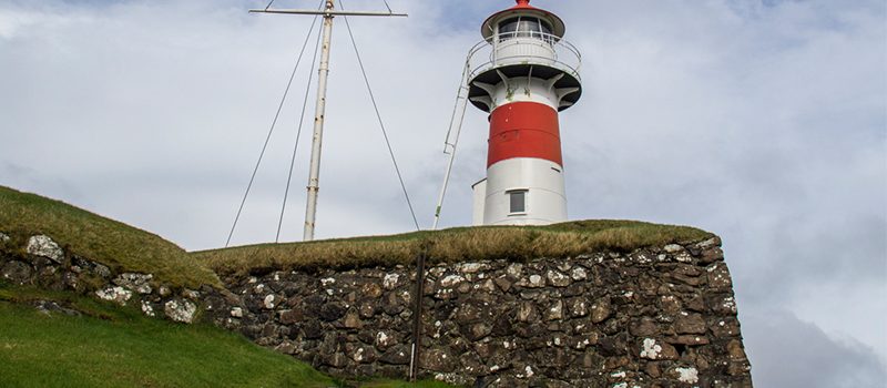 Skansin Fort with Red And White Lighthouse On Faroe Islands