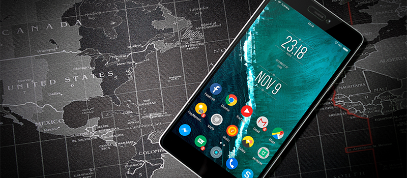 Mobile Phone Showing Popular Apps On A Map