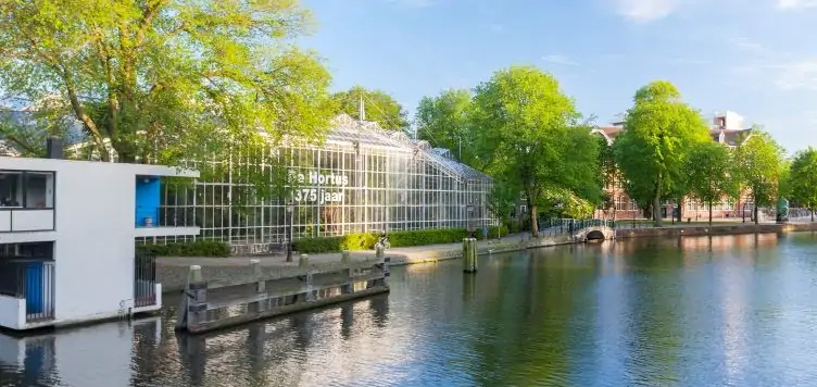 the exterior view of the greenhouse of the Botanic Garden in Amsterdam.