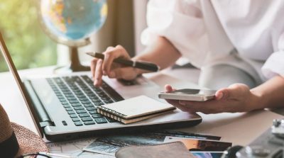 Planning for a holiday in front of laptop