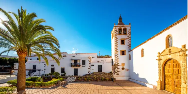 an image of the white buildings in the town square of Betancuria, Fuerteventura