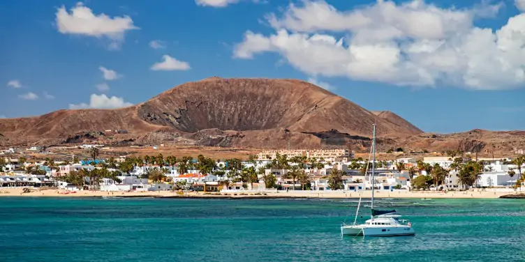 an image of the town of Corralejo, Fuertaventura from the sea