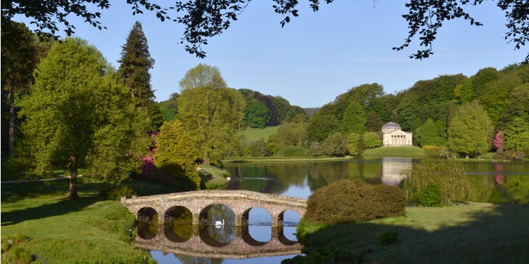 an image of a bridge crossing a lake at Stourhead, Wiltshire