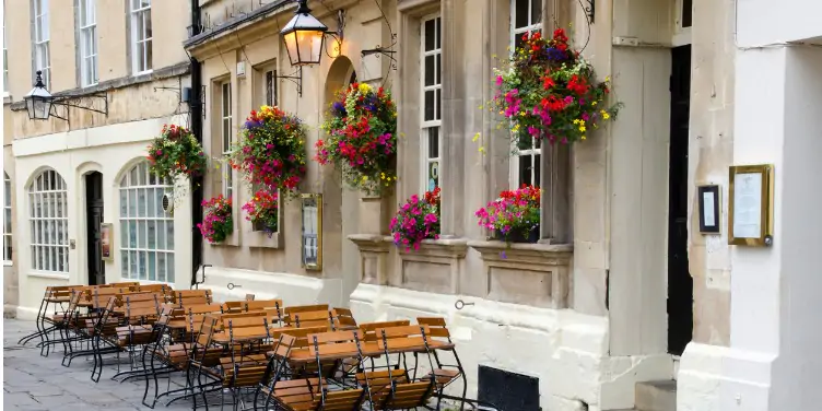 an image of al fresco dining at a street cafe in Bath