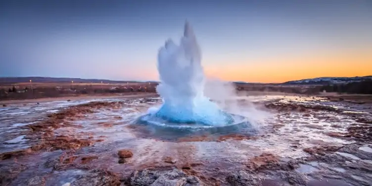 Gullfoss Geysir eruption at sunset
