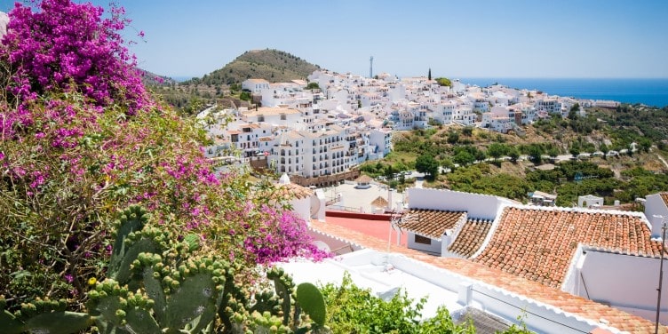 Views over whitewashed buildings of Frigiliana in Malaga, Spain