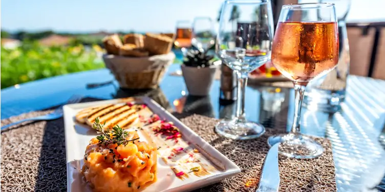 an image of salmon tartare and rose wine