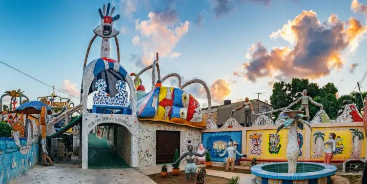 a courtyard with colourful street art in Havana, Cuba