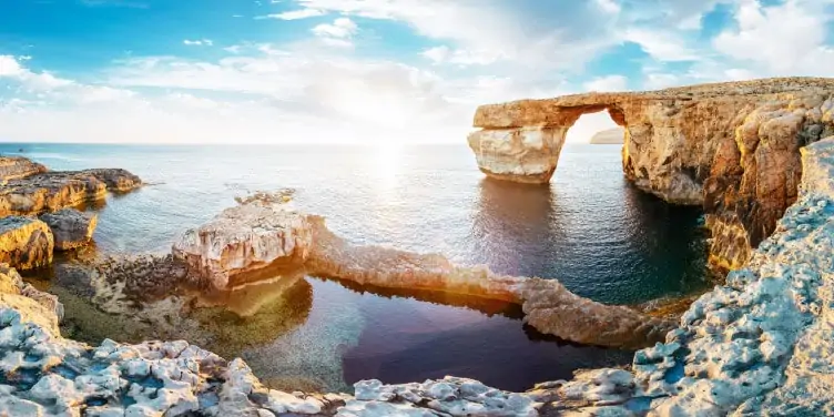 Sunset view of the Azure window in Malta