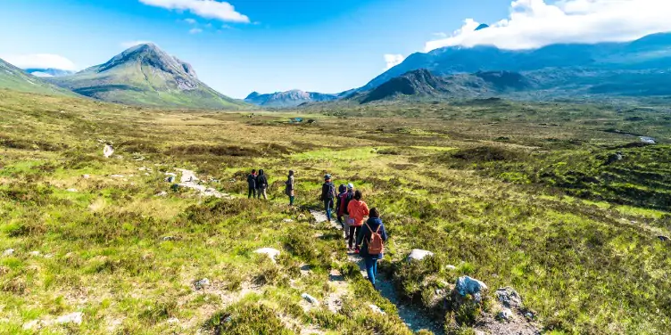 An image of a group of people walking in Scotland