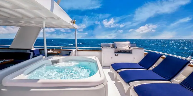 Hot tub spa with deck chairs on a cruise ship