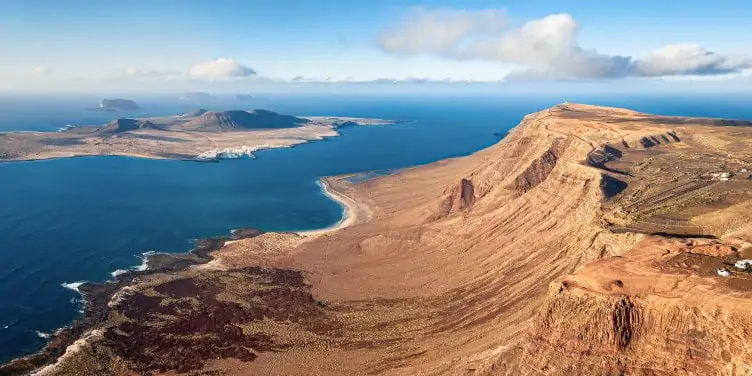 Views of the coast and Mediterranean sea from a Mirador del Rio viewpoint