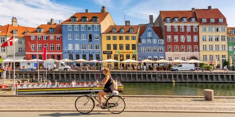 Cyclist in Nyhaven in bike-friendly Copenhagen