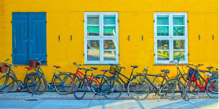 Bikes lined up against a wall in bike-friendly Copenhagen
