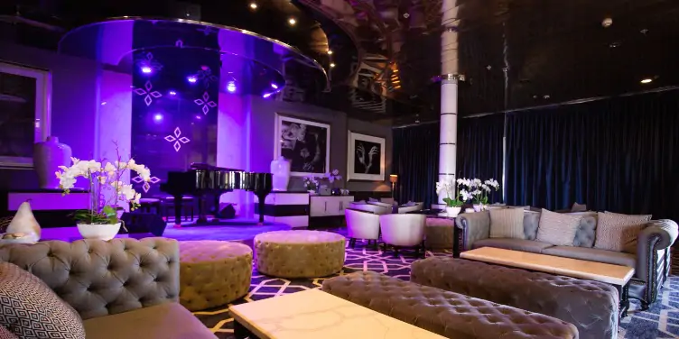 an image of an entertainment lounge onboard the Ambience cruise ship