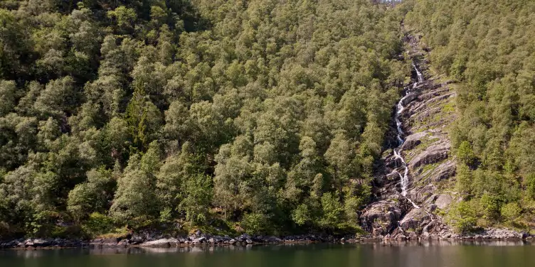 an image of a waterfall in Osterfjord, Norway