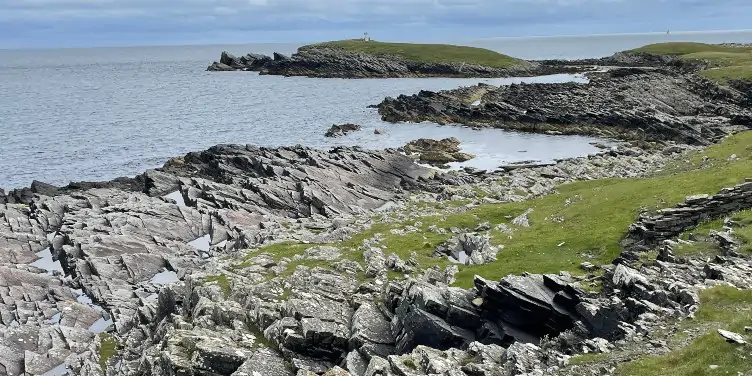an image of a rocky coastal landscape in the Shetland Islands
