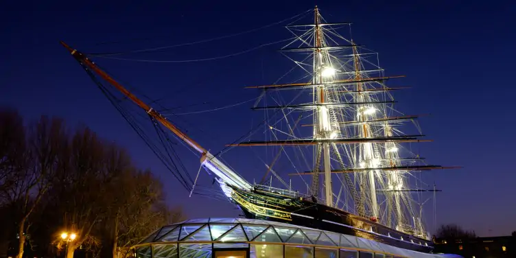 an image of Cutty Sark in London at night