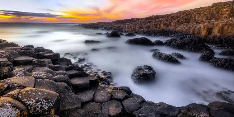 Misty inlet between the basalt columns of the Giant’s Causeway, Northern Ireland