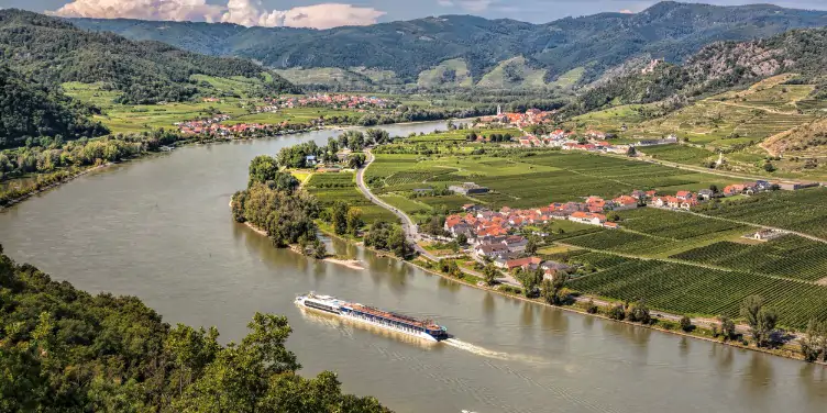 A river cruise ship on the Danube River in Wachau Valley, Austria