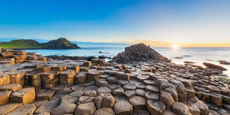 Basalt columns of the Giant’s Causeway in Northern Ireland against the backdrop of the North Atlantic Ocean