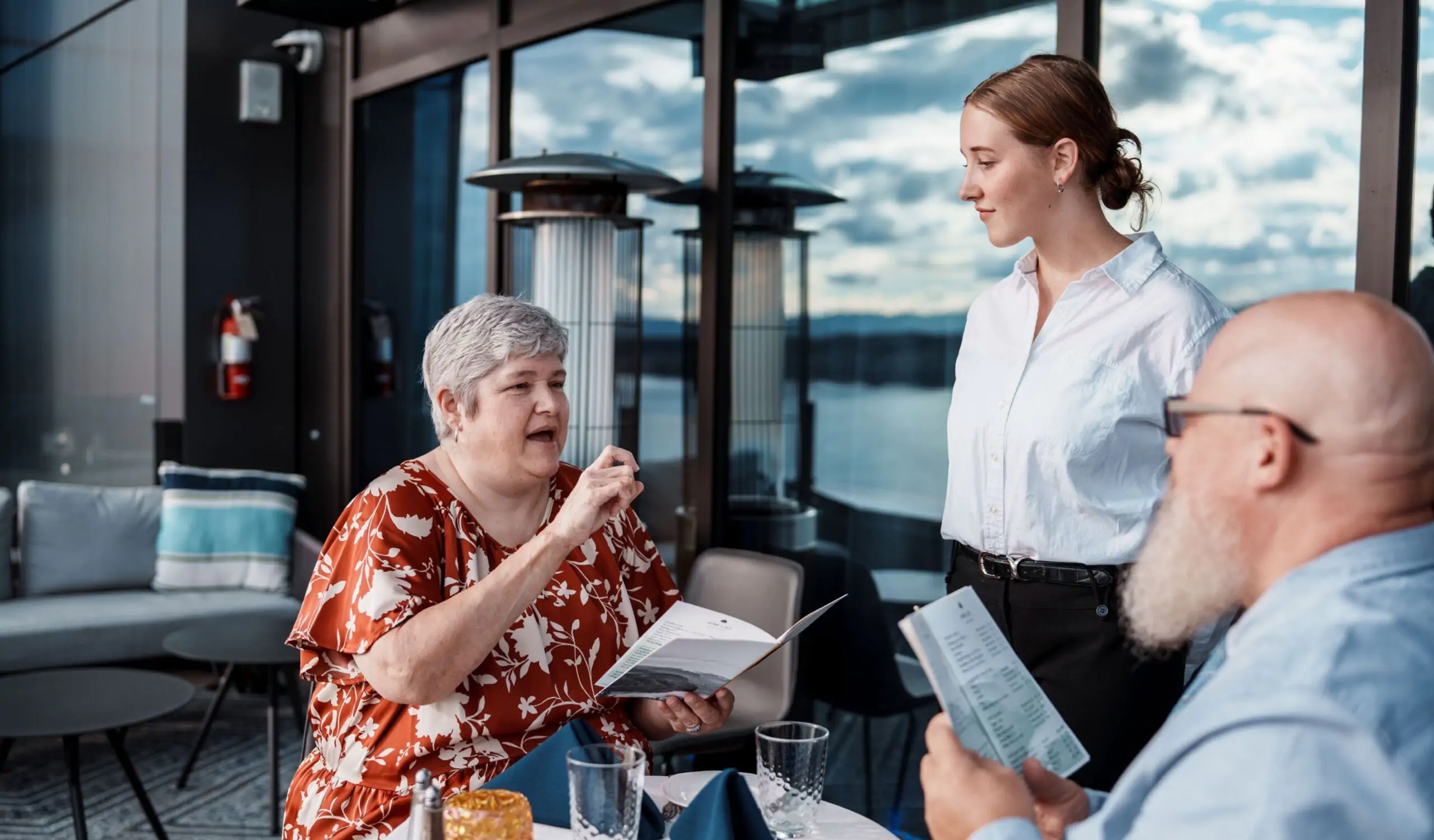 Senior couple with hearing loss at a restaurant