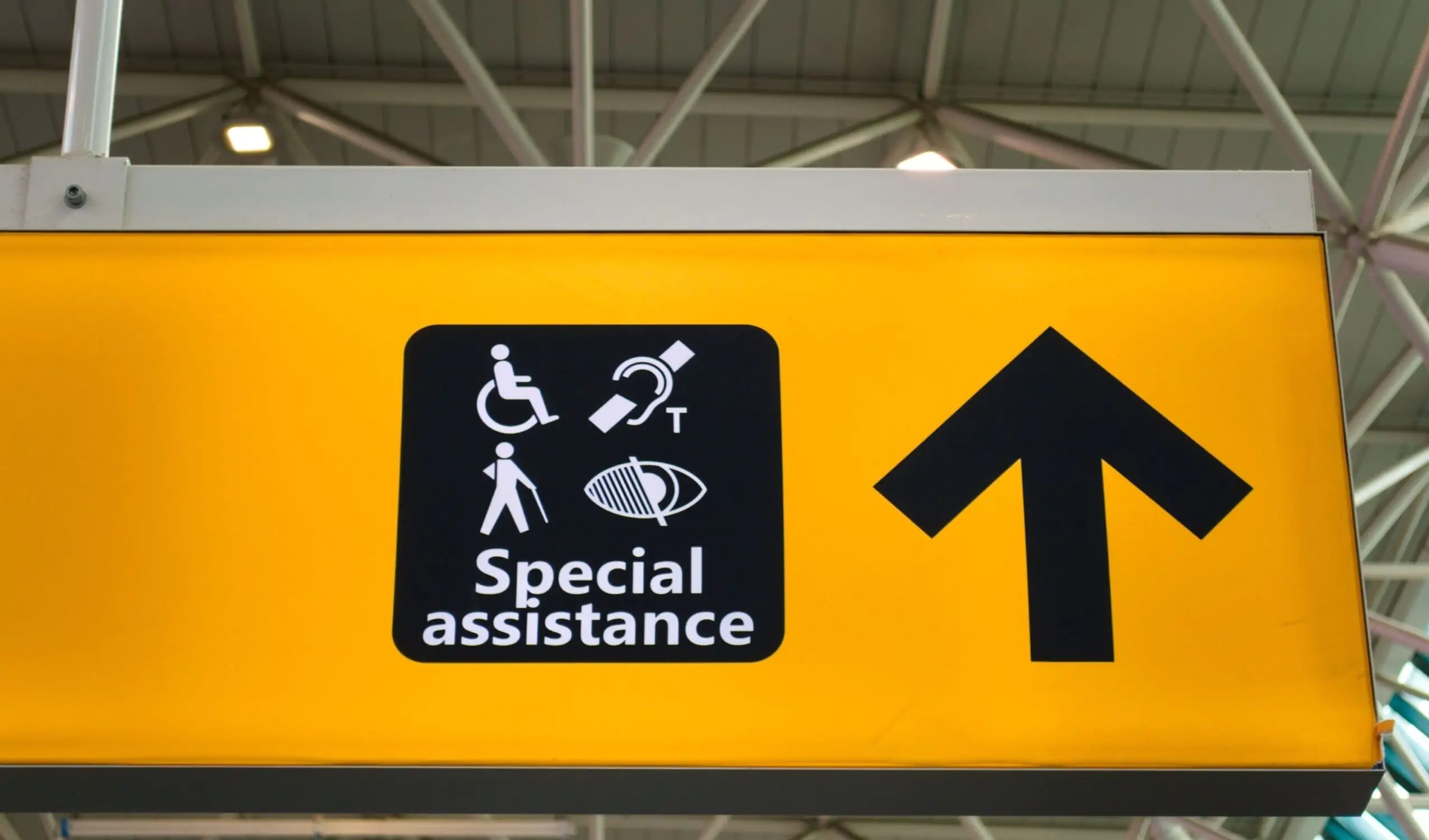 Signs at the airport for special assistance